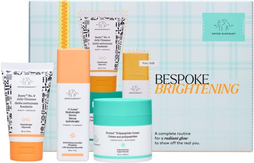 Ihmisille suunnattu valovoimainen ihonhoitosetti, sisältää voiteita ja seerumeita kirkaistavaan ihoon, värikkäitä pakkauksia. Mukana laatikko, jossa teksti Bespoke Brightening.