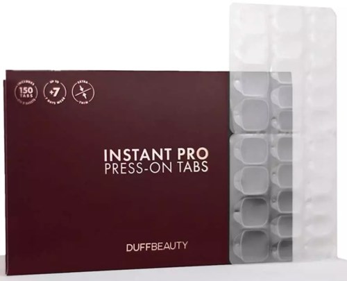 A box of press-on nail tabs called Instant Pro by DufferBeauty, with a clear plastic tray for nails.
