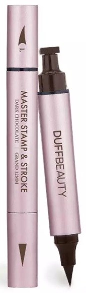 Pink dual-ended makeup pen with one side for stamping and the other for shaping eyebrows.