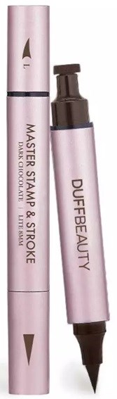 A pink dual-ended cosmetic pen with one side showing a marker tip and the other side a brush tip.