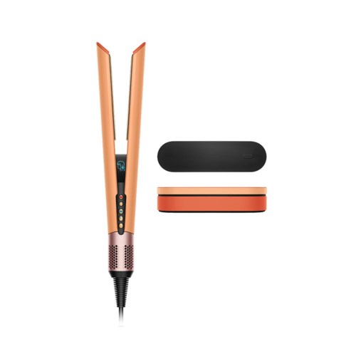 Two hair styling tools and two cases are shown, with one tool resembling a curling iron. The other is a flat iron.