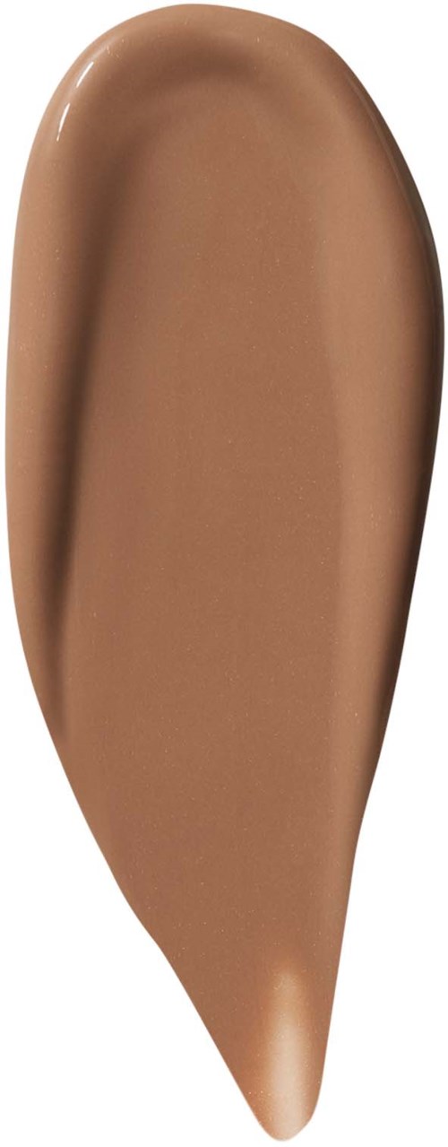 Beige-meikkivoide, jolla on sileä pinta ja pyöreä muoto.