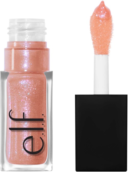 A makeup gloss tube with a shimmery, peach-colored liquid and an applicator wand.