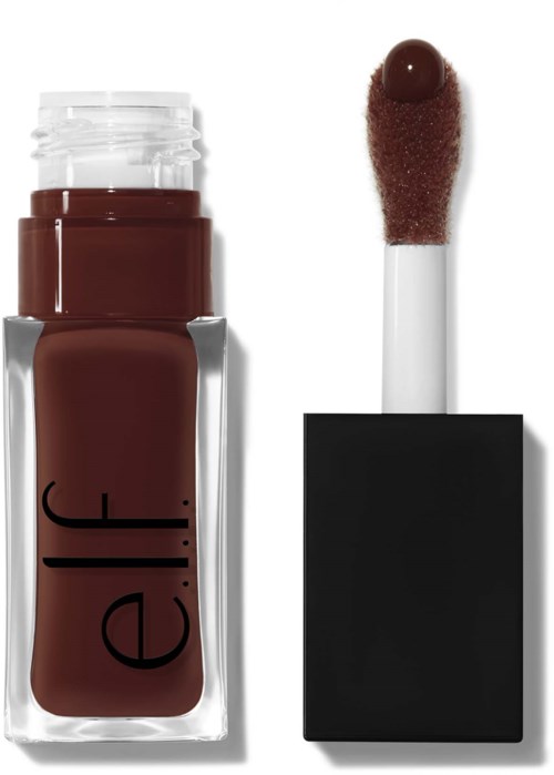A brown liquid lipstick with a clear cap and a black matte square case with a built-in applicator.