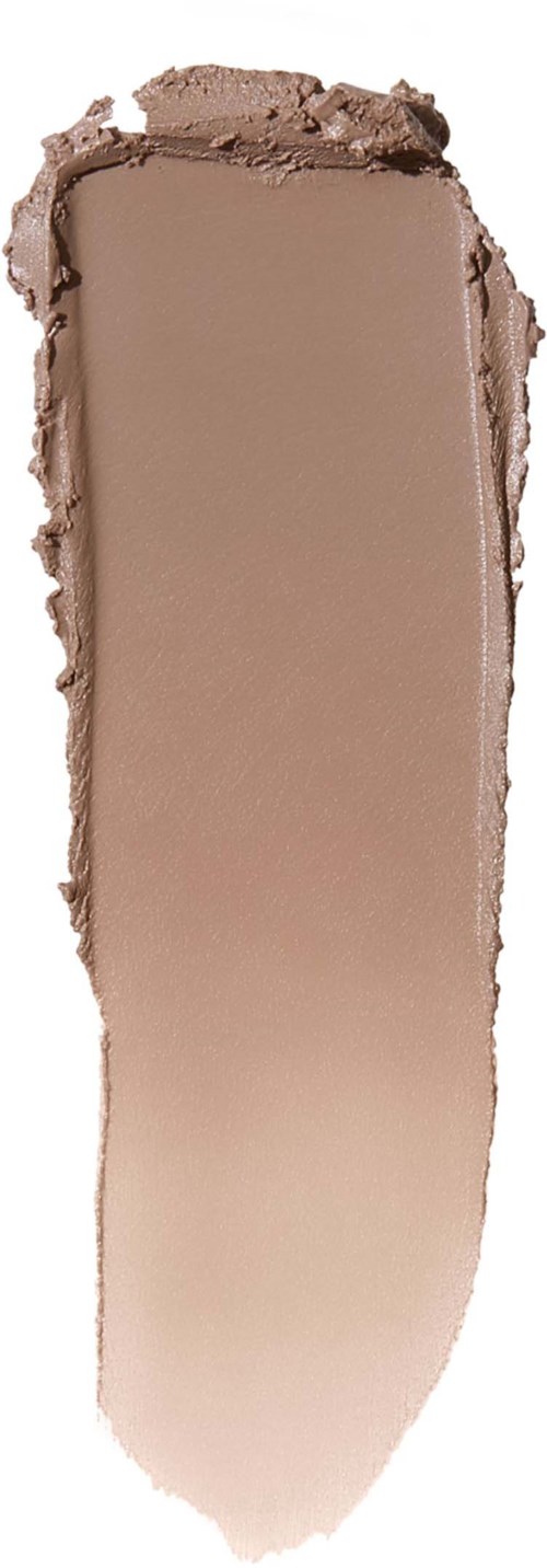 A beige makeup stick with a smooth, creamy texture and a rounded tip. It appears to be used for face or eye makeup.