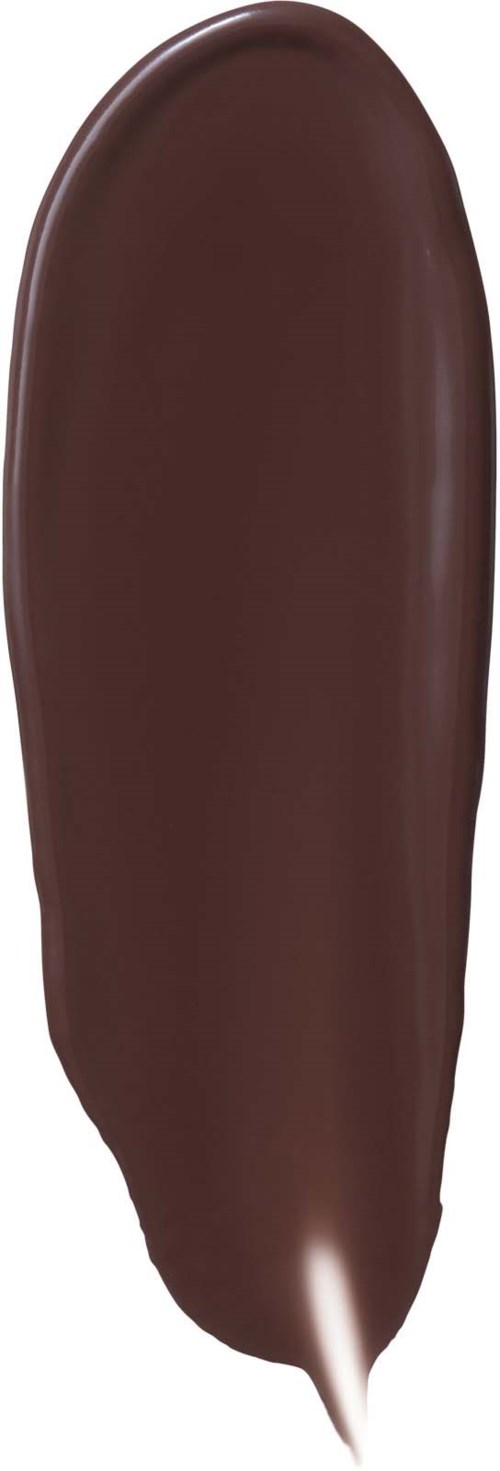 A smear of dark brown creamy substance with a white tip, likely chocolate or decorative icing.
