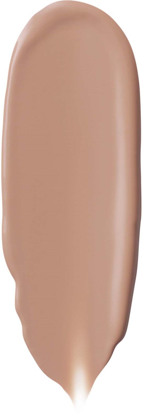 A beige makeup product with a smooth, rounded surface and a tapered end.