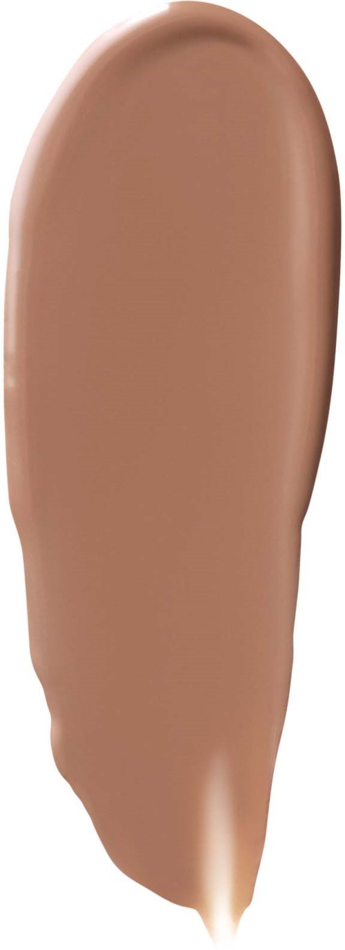 A swatch of light brown foundation or makeup product in a curved, elongated shape.