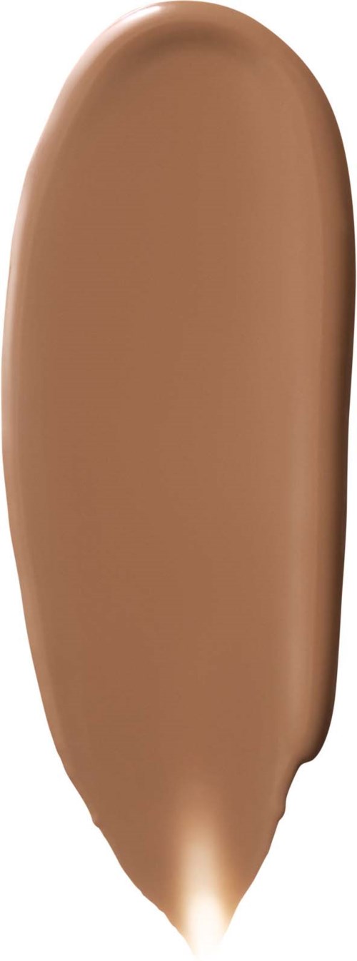 A brown makeup concealer stick with a pointed tip and a rounded body.