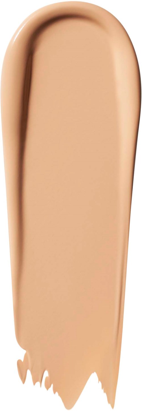 Beige-meikkivoide näyte, sileä ja pitkä muoto, hieman kaareva.