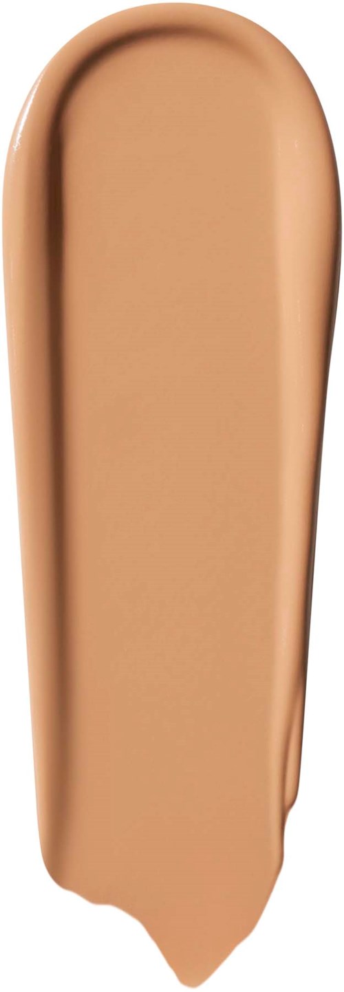 Beige neste nestemmäisestä nestemäisestä meikkivoiteesta valkoisella taustalla. Se levittyy sujuvasti ja pitkänomaisesti.