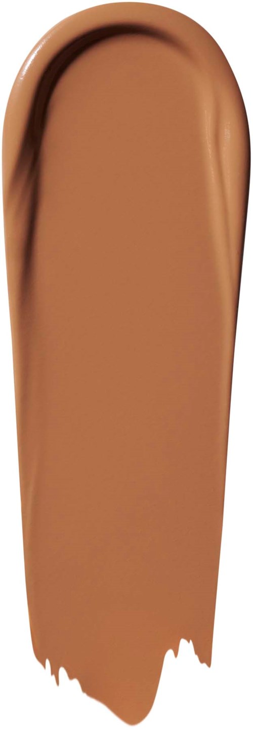 Suuri, pyöreä, ruskean-beige meikkinäyte kiiltävä pinta ja sileä reuna.