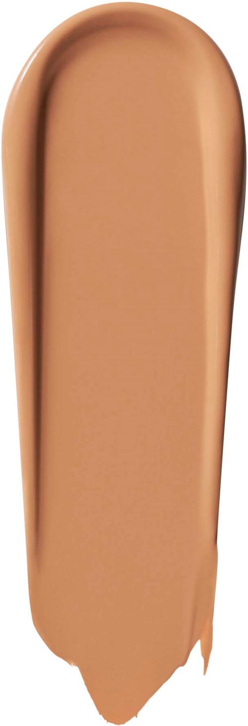 Beige meikkivoide tai foundation-täytekappale, sileä ja pitkänomainen muoto, pieni kärki alaosassa.
