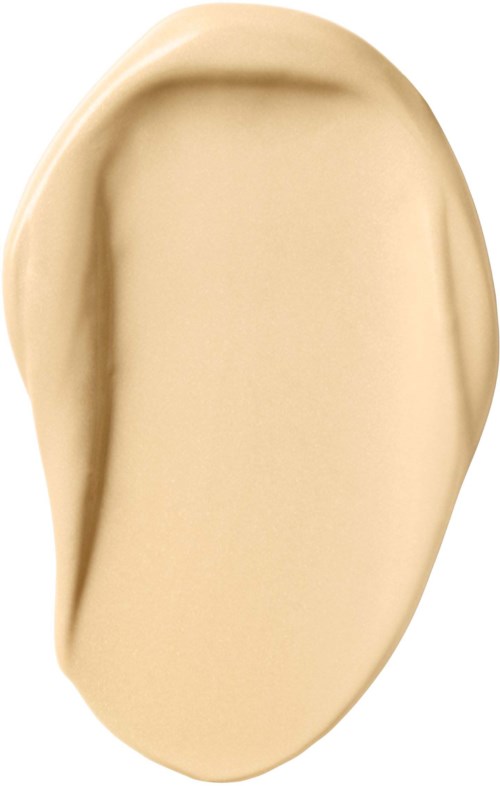 En beige, ovalformad föremål med slät yta och små intryck vid sidorna.