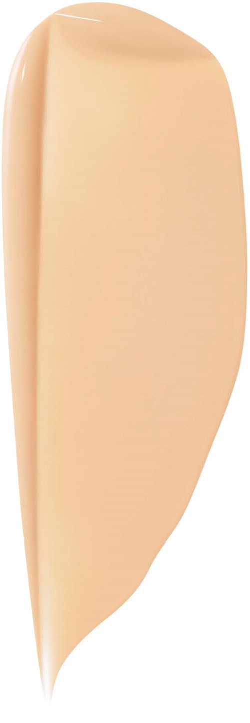 A drop of beige-colored liquid on a white background, shaped like a teardrop.