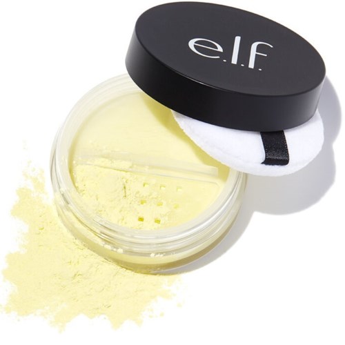 Ett litet gult balm i en klar behållare med svart lock märkt 'e.l.f' och en vit appliceringssvamp.