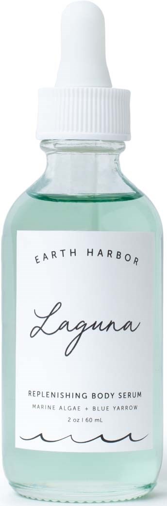 A clear glass dropper bottle with a white label, containing light blue liquid, named Laguna by Earth Harbor.