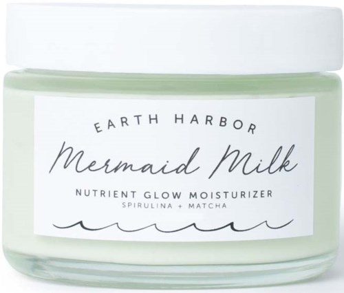 Ein Glas Earth Harbor Mermaid Milk Feuchtigkeitscreme mit Matcha und Spirulina, als Nährstoff-Glow-Feuchtigkeitscreme bezeichnet.