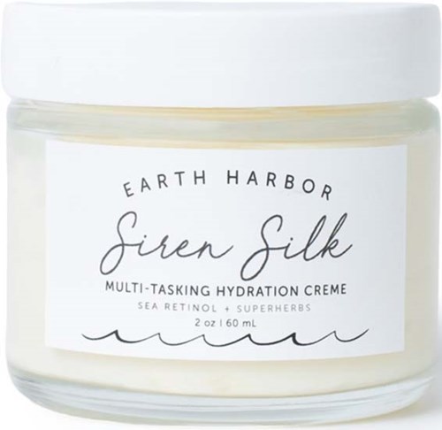 Een witte pot met het etiket Earth Harbor Siren Silk Multi-Tasking Hydration Creme met zeeretinol en superkruiden.