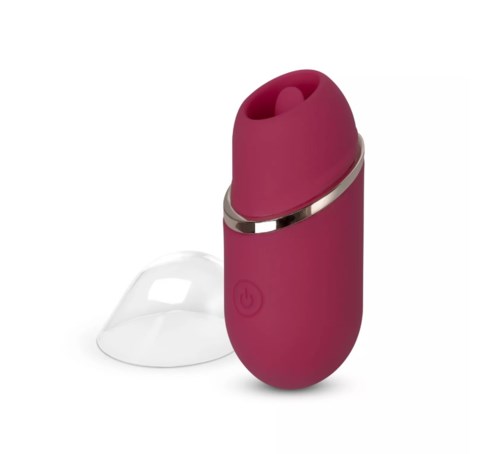 A small, purple, portable device with a clear cover, possibly a personal beauty or health gadget.