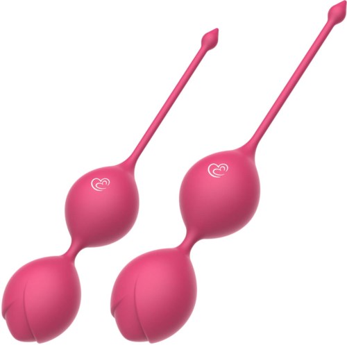 Zwei pinke Kegel-Bälle mit langen Schnüren, verwendet für Beckenübungen.