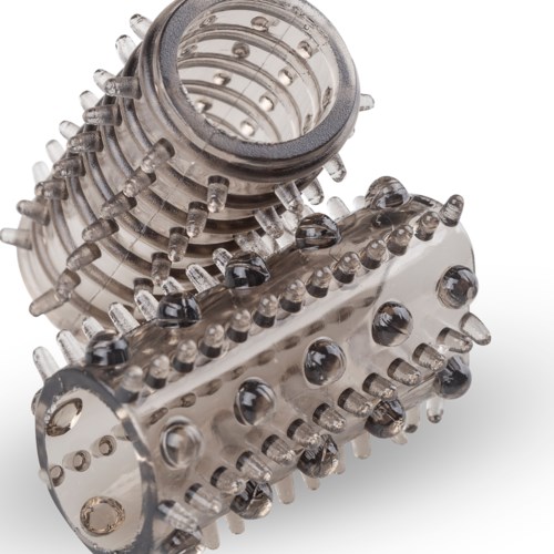 Zwei metallische Rollen mit mehreren kleinen Stiften oder Vorsprüngen in spiralform.
