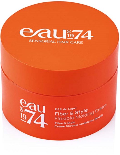 Round orange container with white text, labeled 'Eau de Capri Fiber & Style Flexible Molding Cream.'