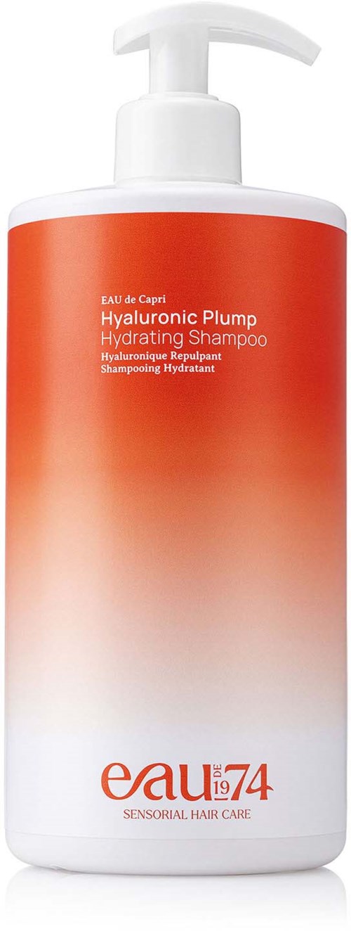 A white and orange shampoo bottle with a pump, labeled 'Hyaluronic Plump Hydrating Shampoo' from Eau 1974.