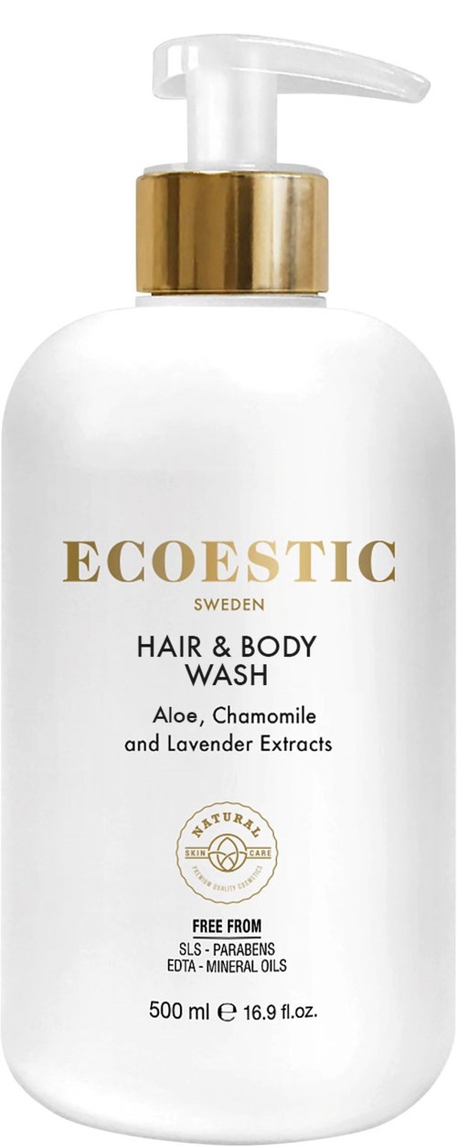 Eine weiße Flasche mit goldener Pumpe für Haar- und Körperwäsche. Sie hat Text mit Aloe, Kamille und Lavendel.