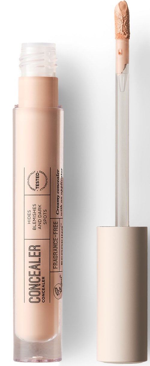 Concealer stick with a doe-foot applicator, in a beige tube, designed to hide skin imperfections.