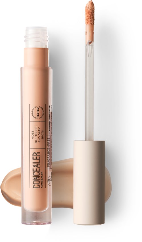 Concealer tube with a doe-foot applicator, beige liquid, and a swatch of the product visible.