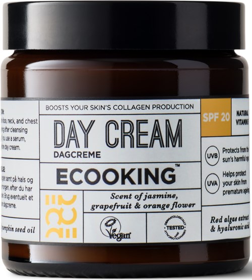 A brown jar labeled EcoKing day cream with SPF 20, jasmine, grapefruit and orange scent, vegan, tested, and protective.