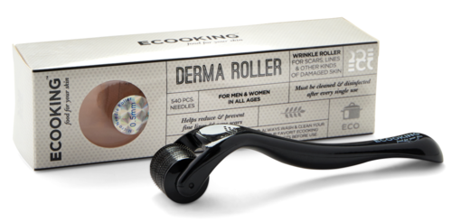 A black beauty roller used for skin care, with a box showing it is for men and women, and has 540 needles.