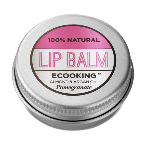 A small round container of lip balm labeled with natural ingredients, almond, argan oil, and pomegranate.