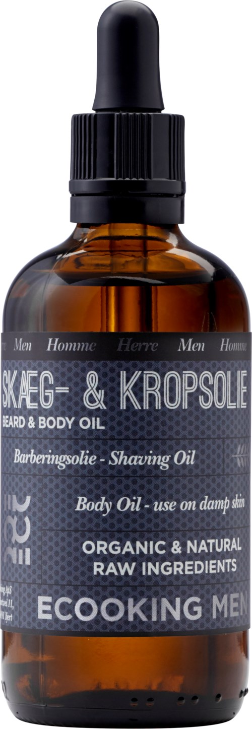 A brown glass bottle with a black dropper cap labeled for beard and body oil, made from natural ingredients.