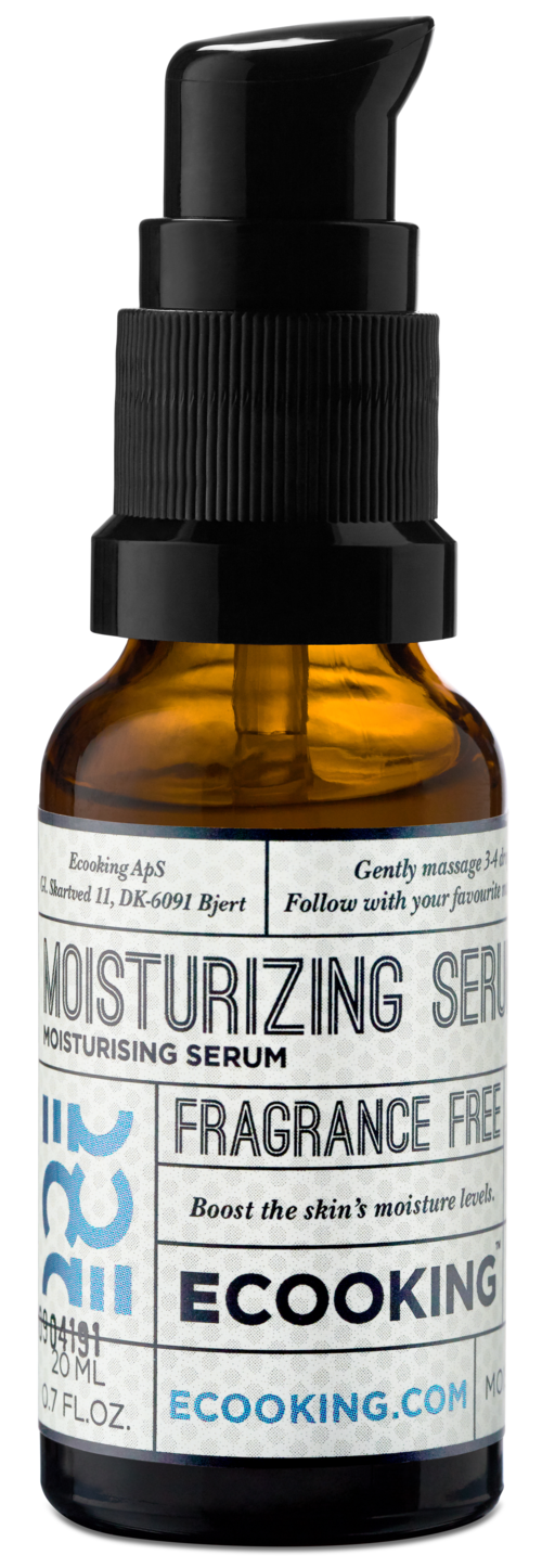 A small amber bottle with a black pump top labeled as moisturizing and fragrance-free serum from EcoKing.