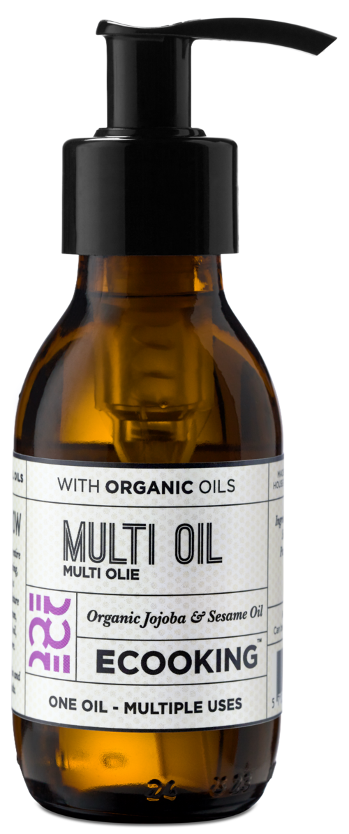 A small amber bottle with a black pump labeled 'Multi Oil' containing organic jojoba and sesame oils.