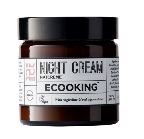 Ein Glas mit Eco King Nachtcreme mit schwarzem Deckel, Etikett zeigt Inhaltsstoffe und Produktname.