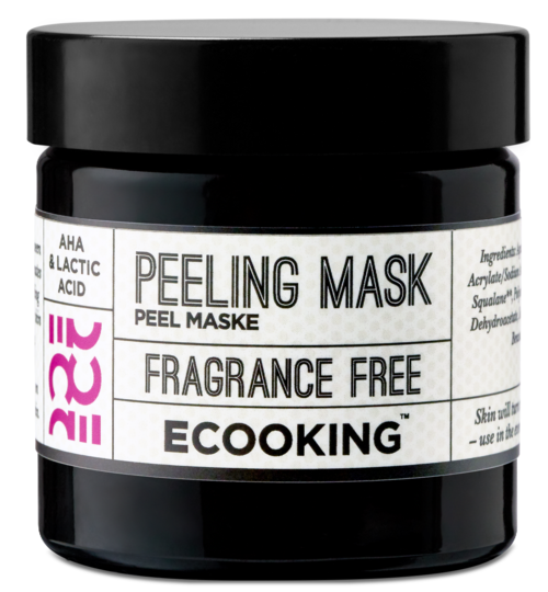 A black jar with a white label, pink and black text, and a black lid. The label says peeling mask, fragrance free.