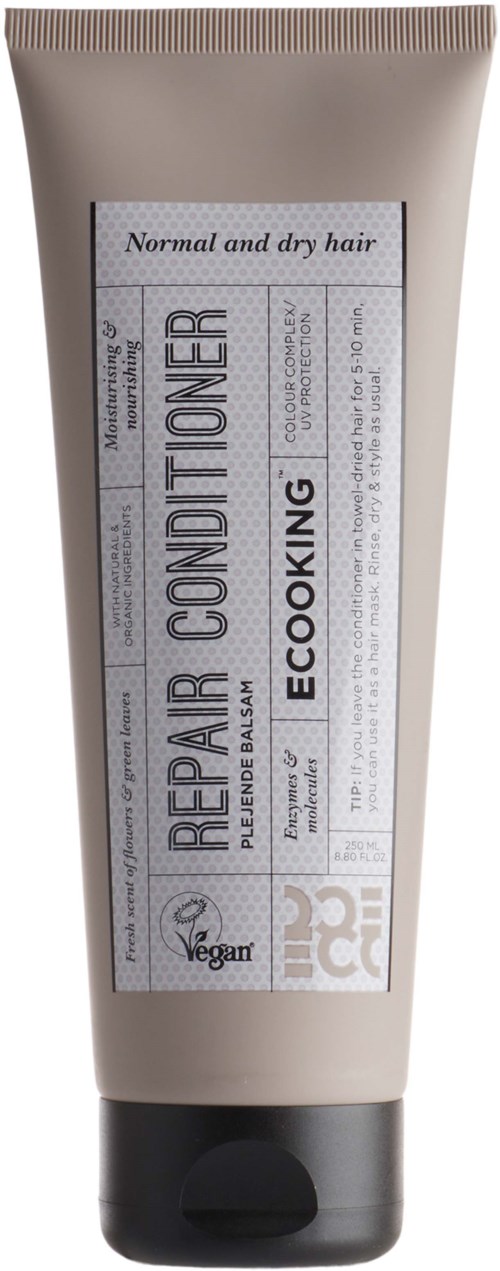 A beige tube with a black cap, labeled for normal and dry hair, 'Repair Conditioner' by Ecooking, has vegan and eco-friendly icons.