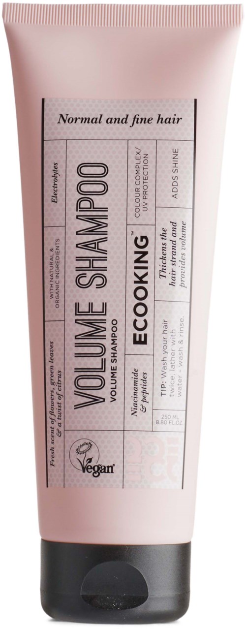 Pink tube of eco-friendly volume shampoo for normal and fine hair with black cap.