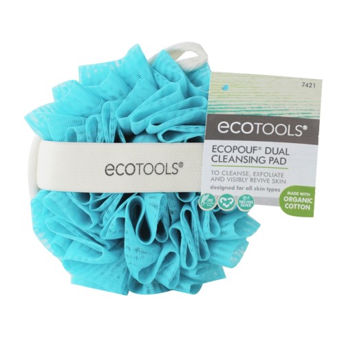 Blue cleansing pad with a white strap and label. Made from organic cotton, designed for all skin types.
