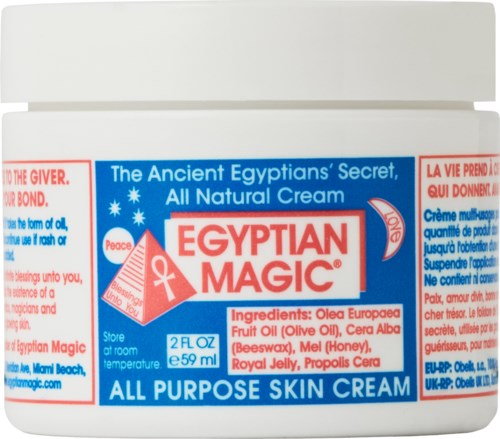 The container shows Egyptian Magic all-purpose skin cream with ingredients and branding in English and French.