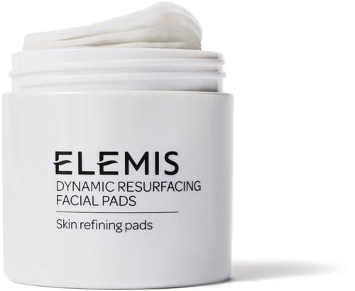 Ein weißer Behälter mit Elmis Beschriftung, Hautpflegetext und sichtbaren Pads.