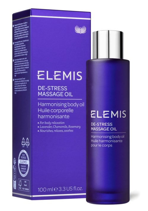 Eine blaue Schachtel und Flasche mit Elemis De-Stress Massageöl zur Körperentspannung. Sie haben silberne Deckel und schlichtes Design.