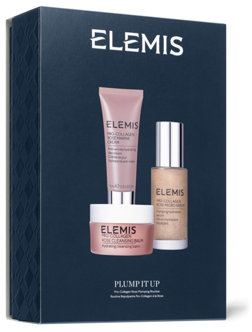 Eine Schachtel mit drei Elemis Hautpflegeprodukten: eine rosa Tube, eine Flasche und ein Glas.