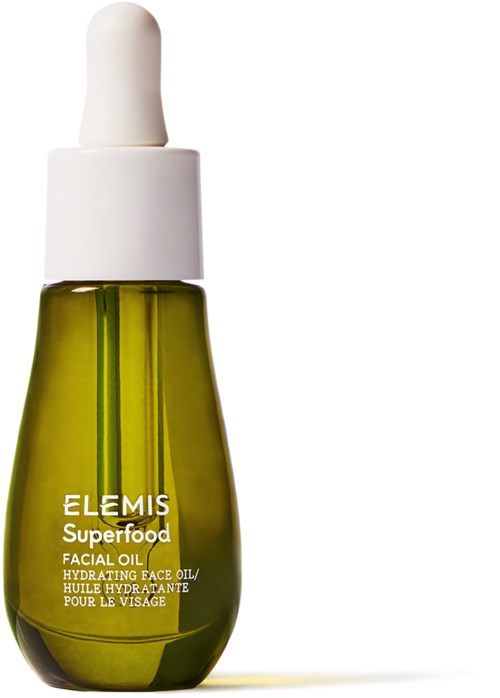Eine grüne Glasflasche mit weißem Tropfer, enthält Elemis Superfood Gesichtsöl.