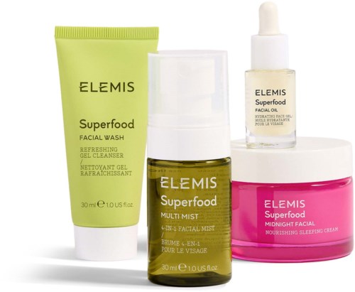 Four skincare products: a green tube of facial wash, a yellow bottle of multi-mist, a small face oil dropper bottle, and a pink jar of sleeping cream.