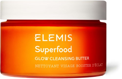 A jar of Elemis Superfood Glow Cleansing Butter with orange and white packaging.