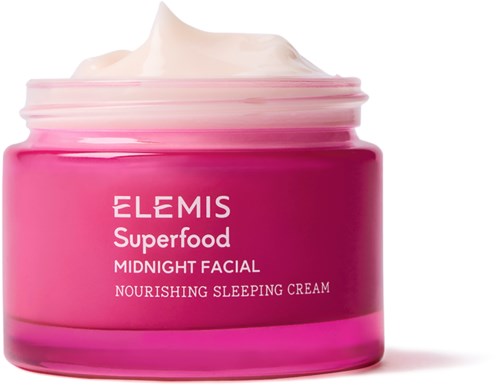Ein pinker Behälter von Elemis Superfood Midnight Facial Nourishing Sleeping Cream mit sichtbarer Creme über dem Deckel.